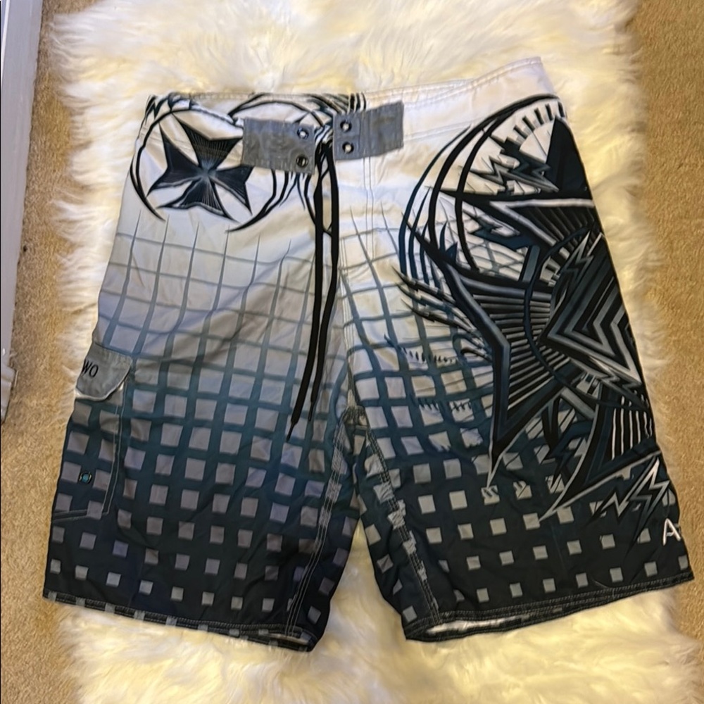Black and Gray Geometric Board Shorts with Gradient Design